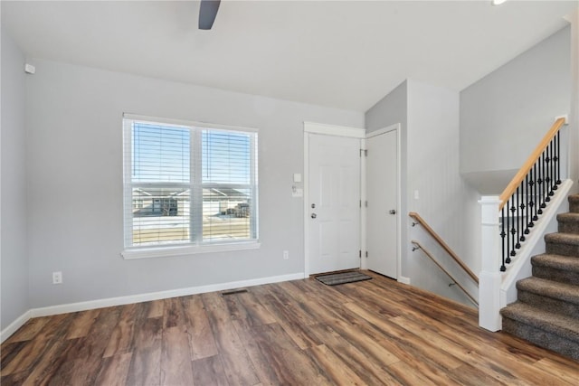 foyer entrance with hardwood / wood-style flooring