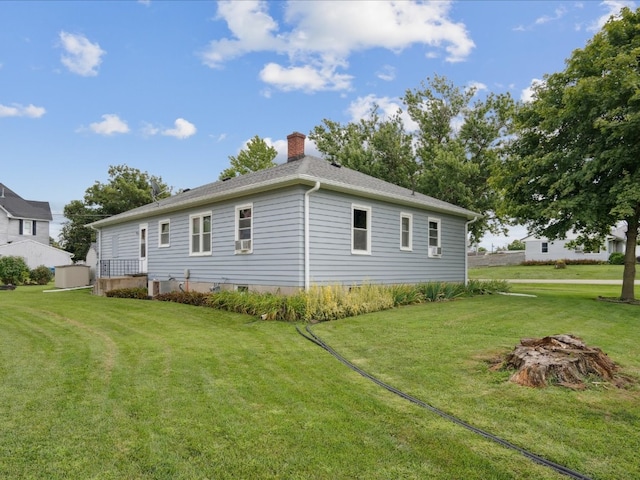 view of property exterior with a yard