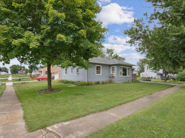 view of front of home with a front lawn