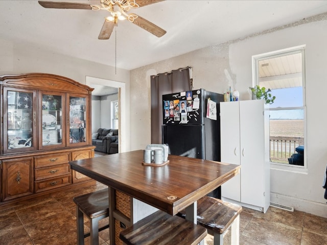 dining room with ceiling fan