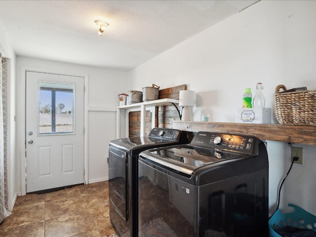 laundry room featuring washer and clothes dryer