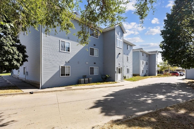 view of property exterior featuring central AC