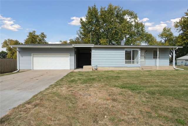 single story home featuring a garage and a front yard