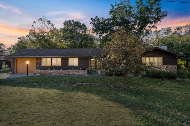 view of front of house with a lawn