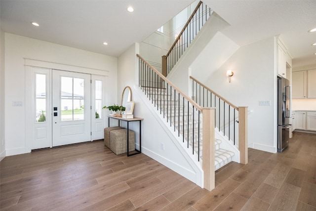 entrance foyer featuring light hardwood / wood-style floors