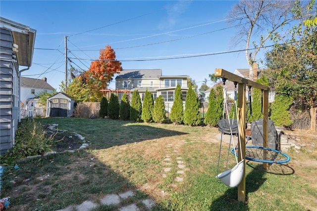 view of yard featuring a storage shed