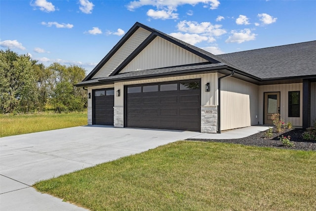 exterior space with a yard and a garage