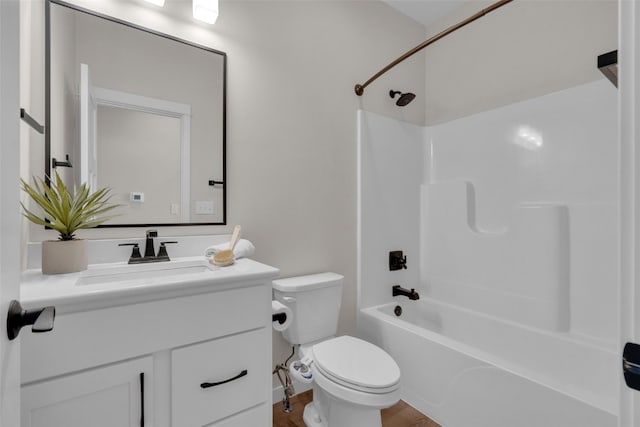 full bathroom with bathtub / shower combination, vanity, wood-type flooring, and toilet