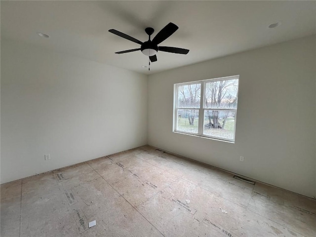 spare room featuring ceiling fan