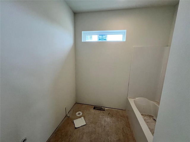 bathroom with a washtub