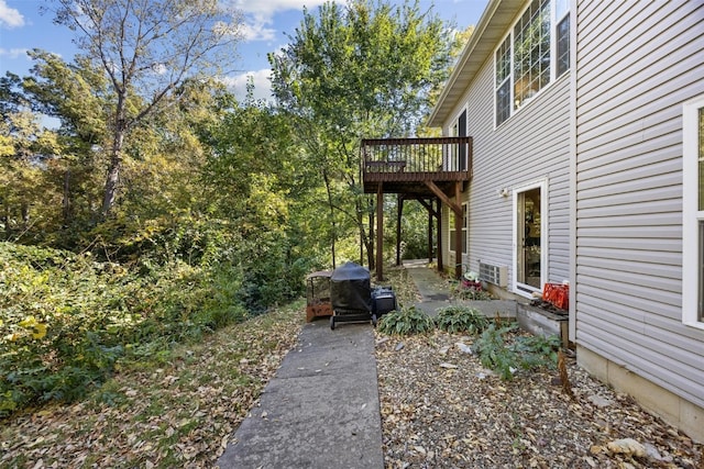 view of yard with a patio and a deck