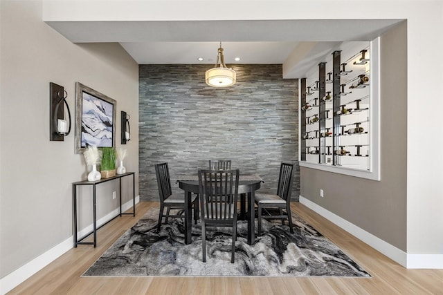 dining room with hardwood / wood-style floors