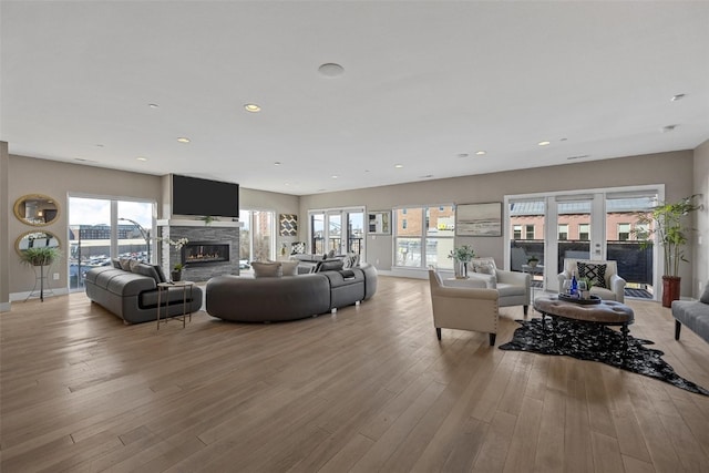 living room with light hardwood / wood-style floors