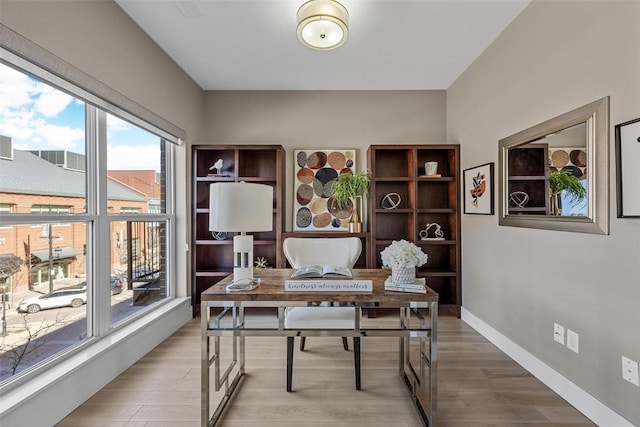 office space with hardwood / wood-style flooring