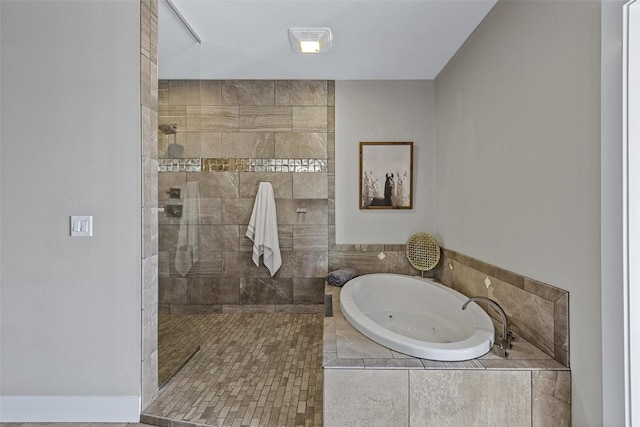 bathroom with shower with separate bathtub