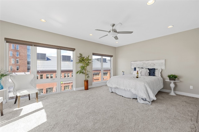 bedroom with ceiling fan and carpet flooring