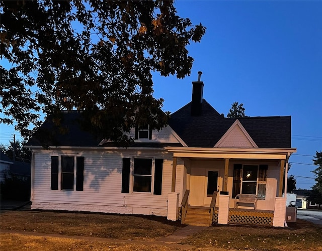 view of front of home featuring covered porch