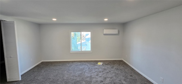 carpeted empty room with an AC wall unit