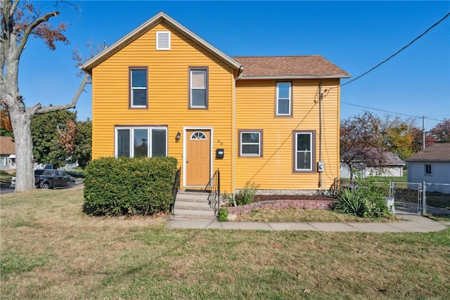 front facade with a front lawn