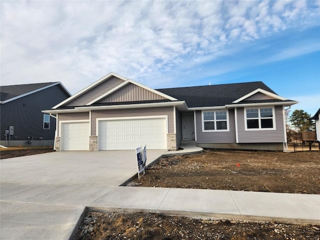 view of front of house with a garage and driveway