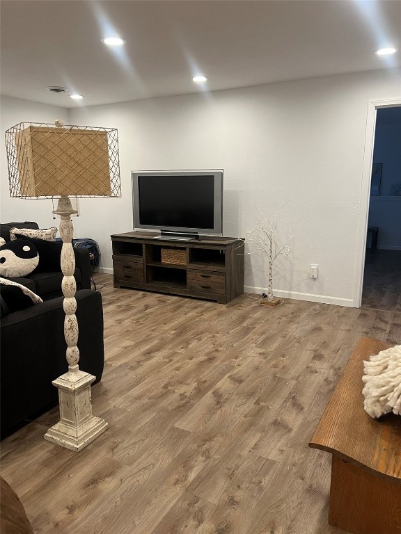 living room with hardwood / wood-style flooring