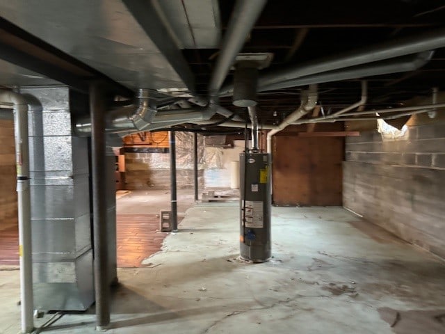 basement featuring water heater