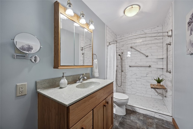 bathroom featuring vanity, toilet, and a shower with curtain