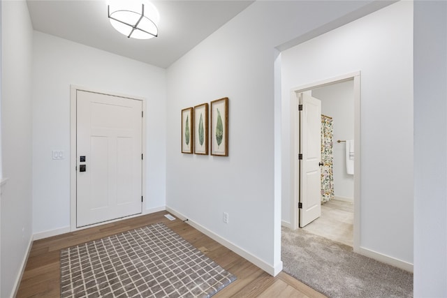 entrance foyer featuring hardwood / wood-style floors