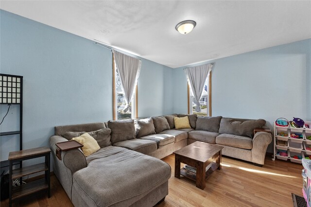 living room featuring light wood-type flooring