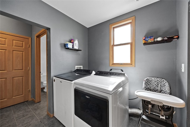 laundry room with washer and dryer