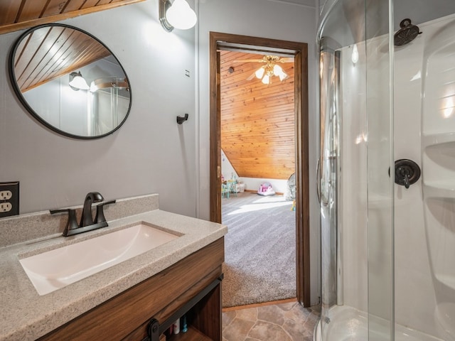 bathroom featuring vanity, ceiling fan, walk in shower, and wooden walls