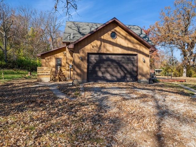 view of side of property featuring a garage