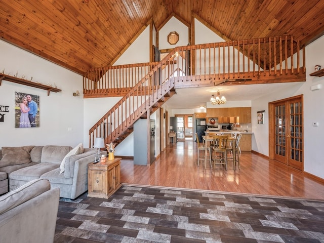 living room with french doors, high vaulted ceiling, wood ceiling, and dark hardwood / wood-style flooring