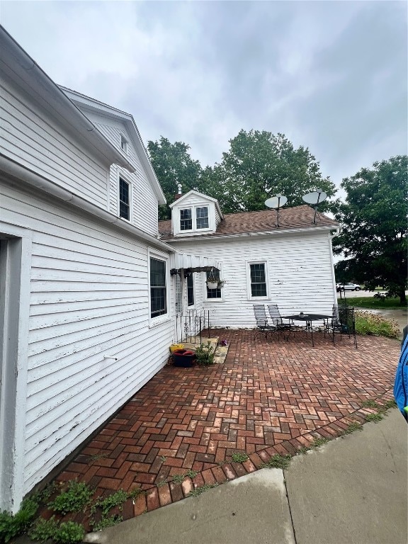 rear view of property with a patio area