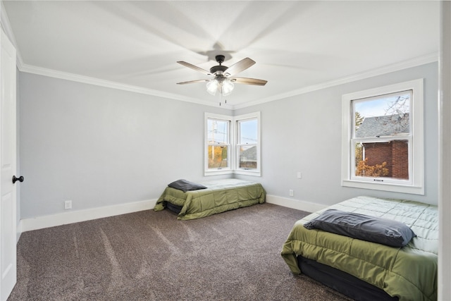 bedroom with multiple windows, crown molding, ceiling fan, and carpet flooring