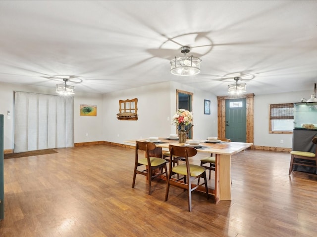 dining area featuring hardwood / wood-style floors