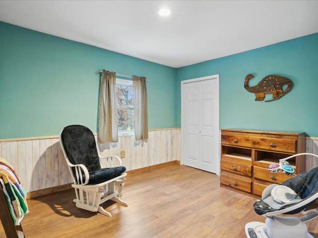 living area with light hardwood / wood-style flooring