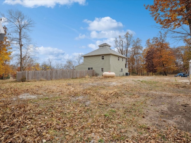 view of side of home featuring central air condition unit