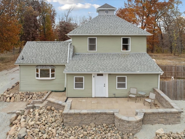 back of house with a patio area