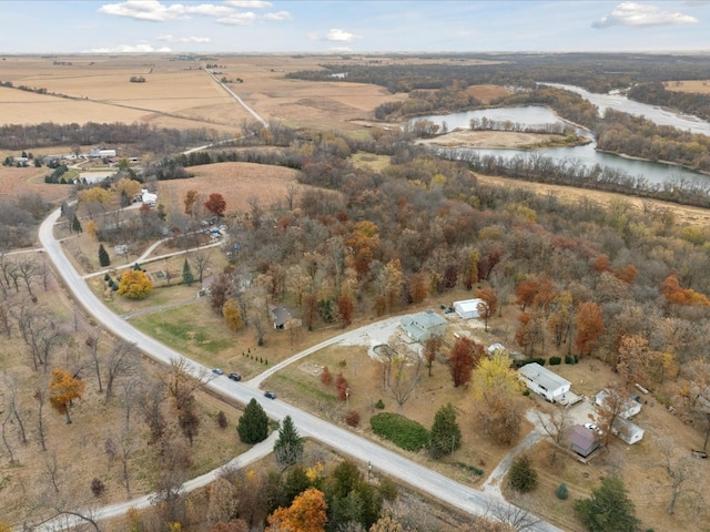 drone / aerial view featuring a rural view and a water view