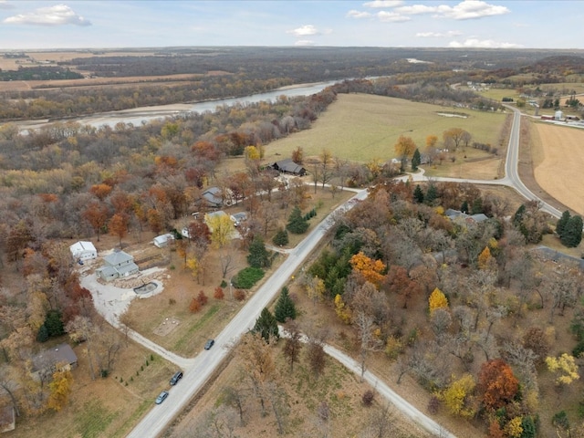 birds eye view of property with a rural view and a water view