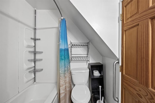 bathroom with toilet, shower / bath combo with shower curtain, and vaulted ceiling