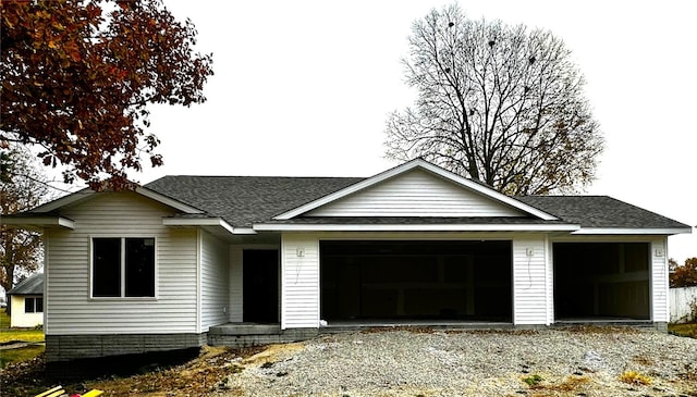 single story home with a garage