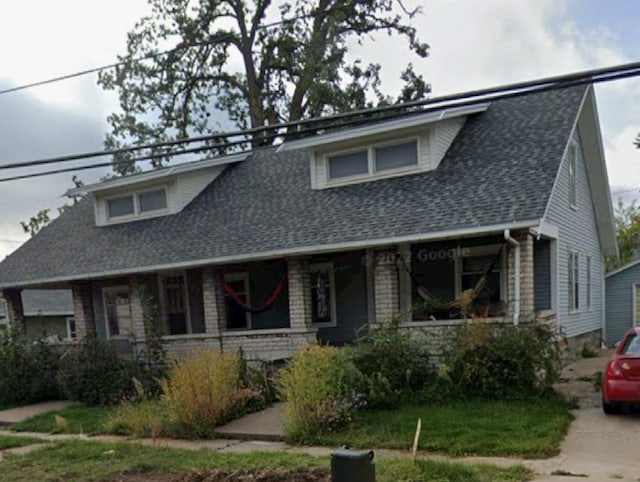 view of front of property featuring covered porch