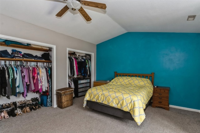 bedroom with lofted ceiling, carpet flooring, and ceiling fan