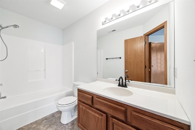 full bathroom featuring tile patterned flooring, washtub / shower combination, vanity, and toilet