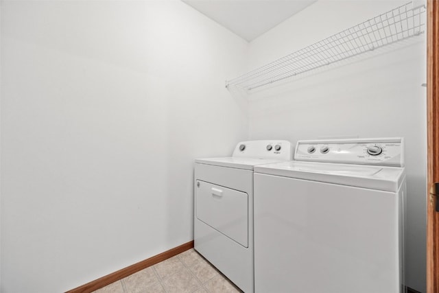 clothes washing area with independent washer and dryer