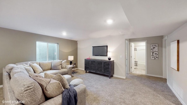 living room featuring light colored carpet