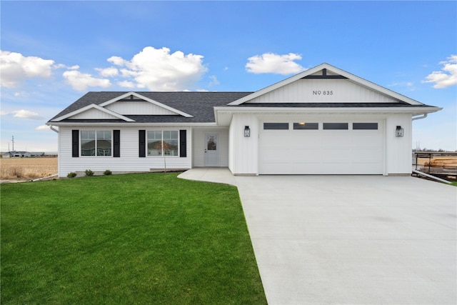 ranch-style home with a garage and a front lawn