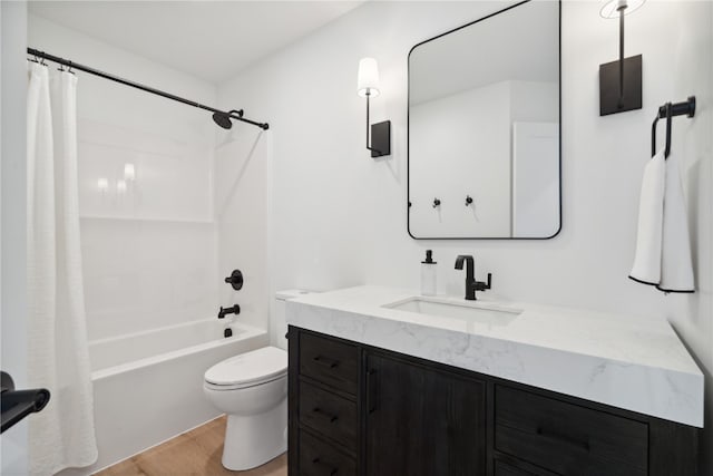 full bathroom featuring wood-type flooring, vanity, toilet, and shower / tub combo